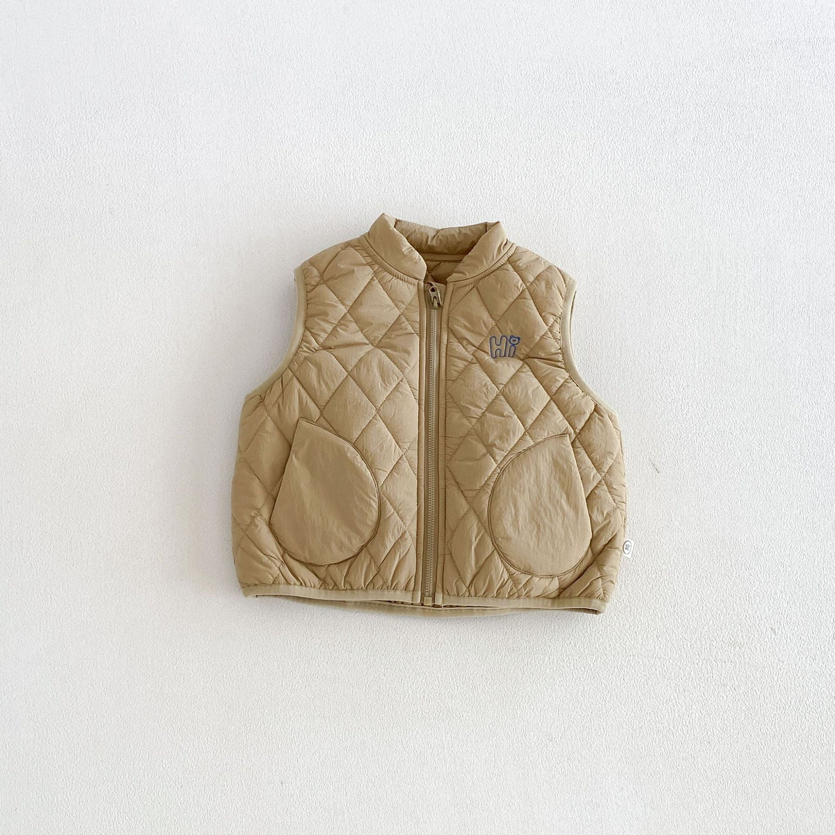Sand quilted puffer vest, front view