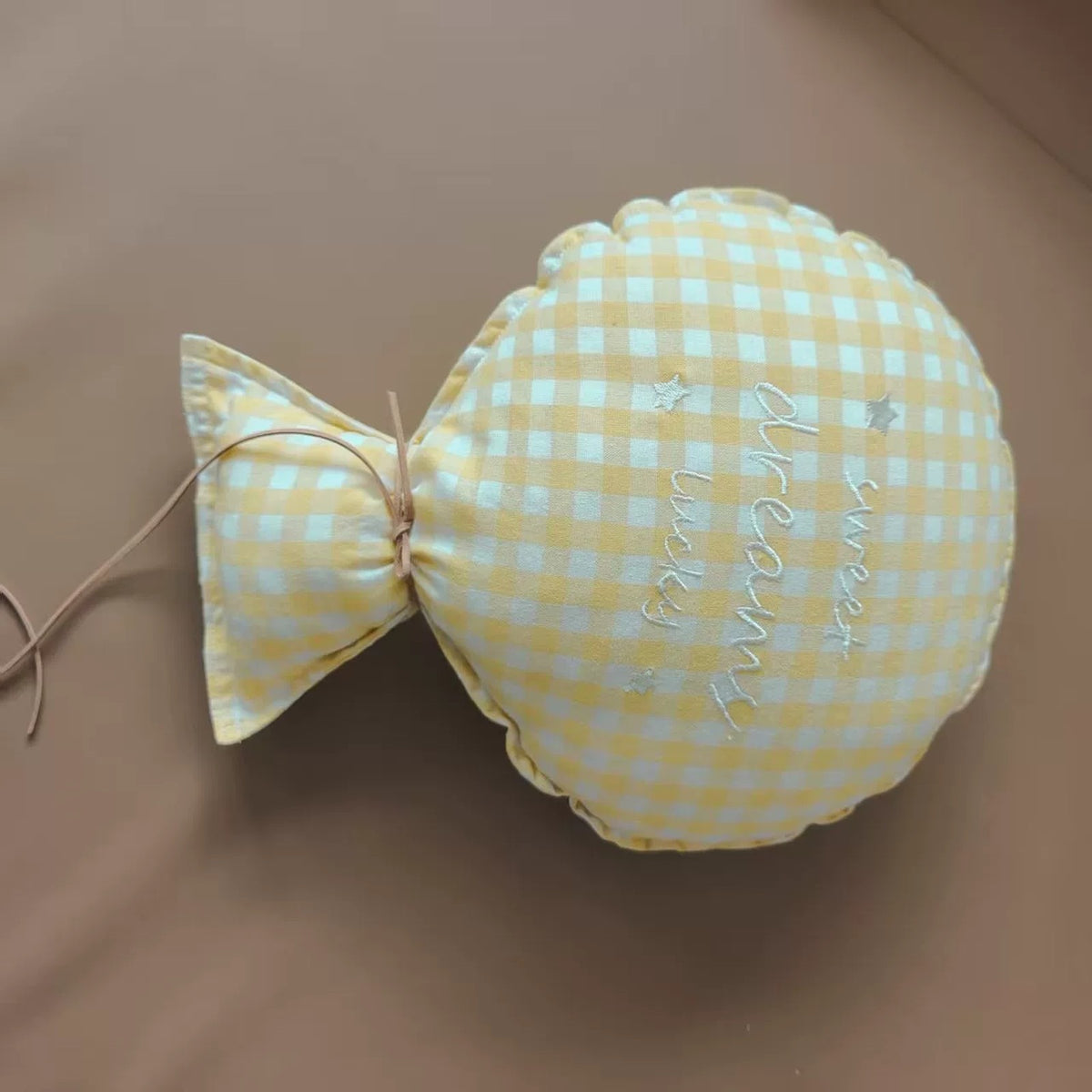 Butter gingham balloon pillow embroidered "sweet dreams lucky"