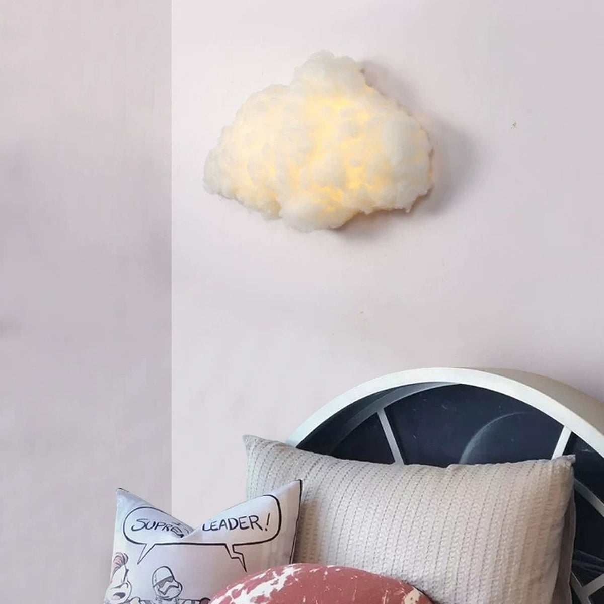 Warm-lit cloud lamp in a child's bedroom corner