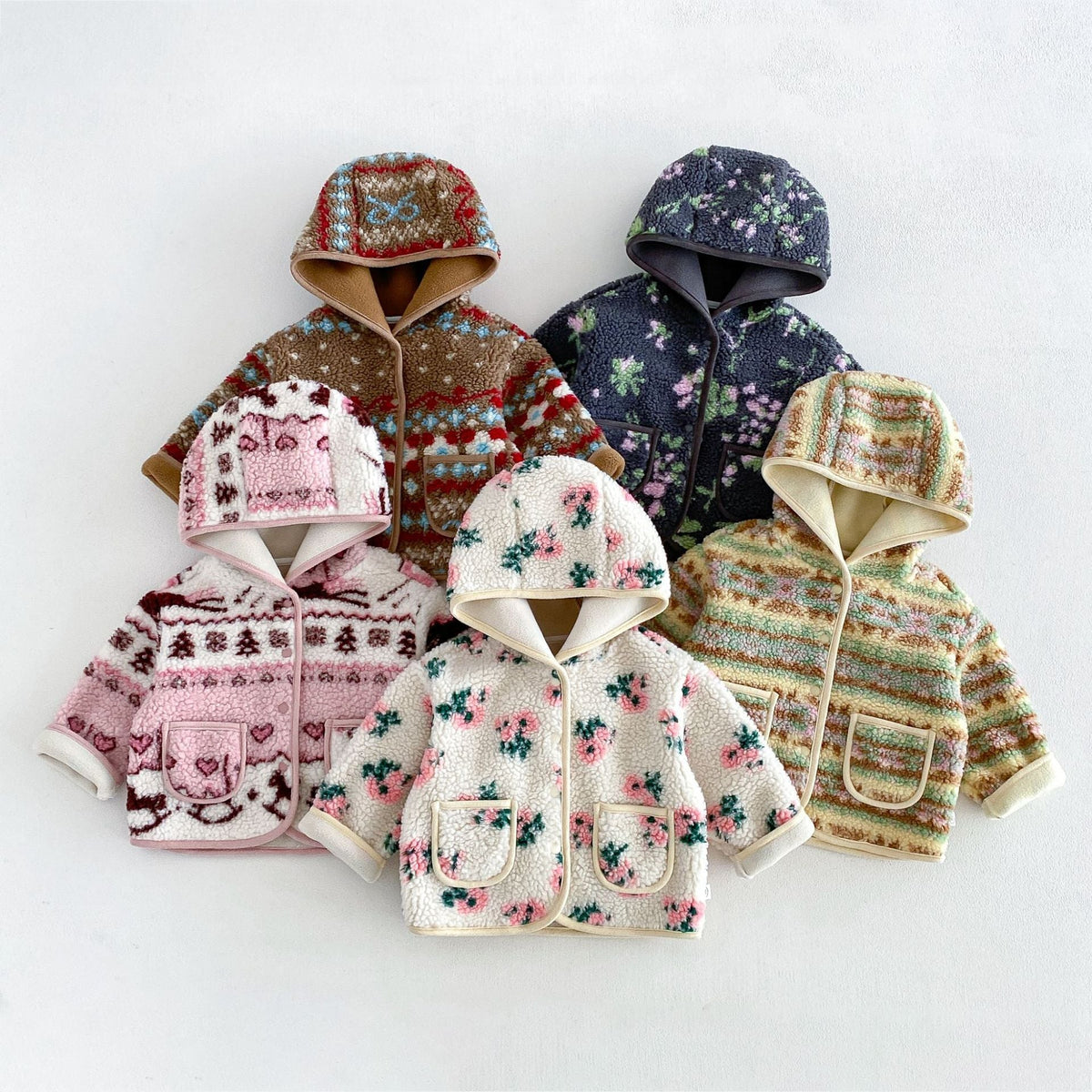 Five hooded sherpa jackets for kids in retro patterns and florals