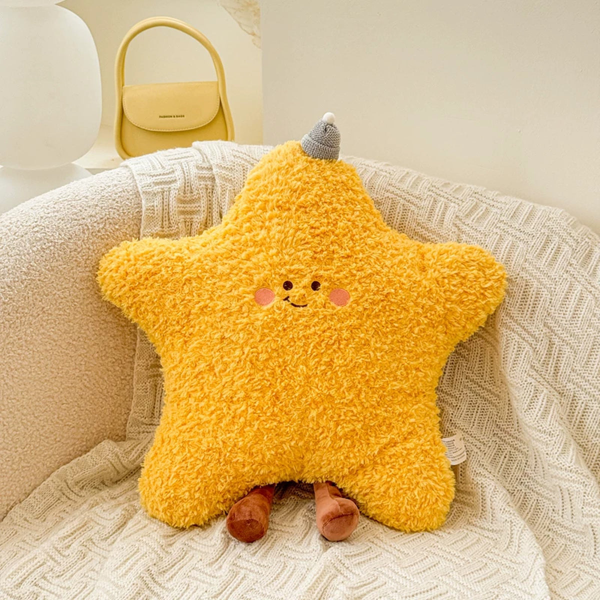 Yellow star plush cushion with little legs
