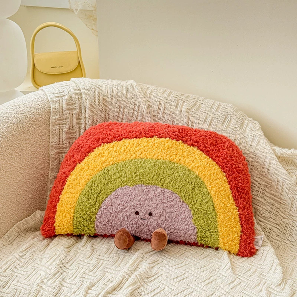 Rainbow plush cushion in red, yellow, green and lilac