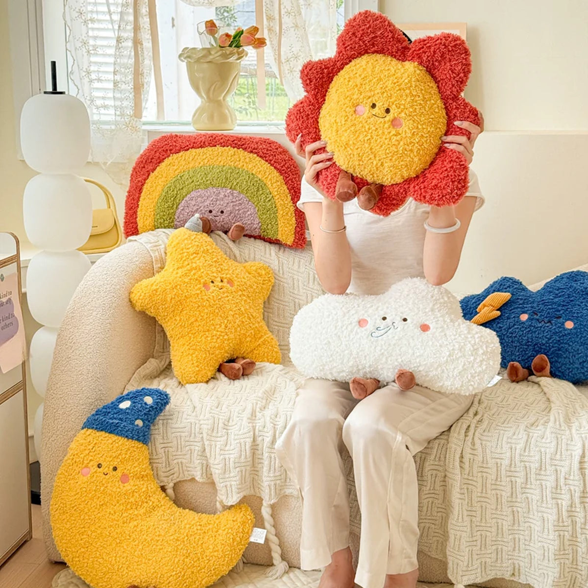 The full sky cushion collection styled on a sofa
