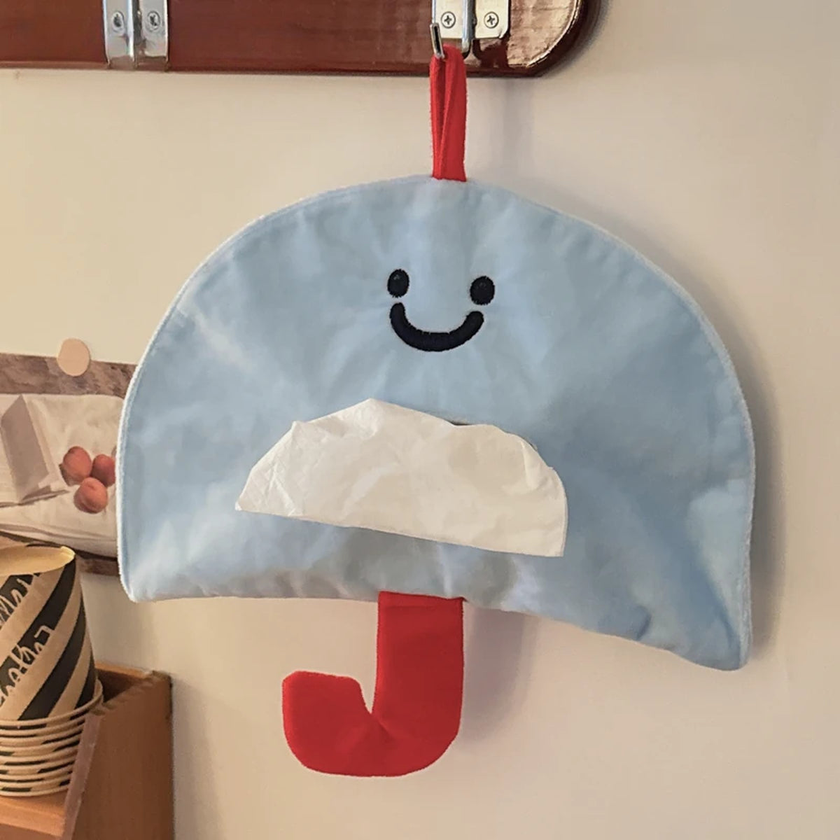 Sky blue smiling umbrella tissue holder with red handle