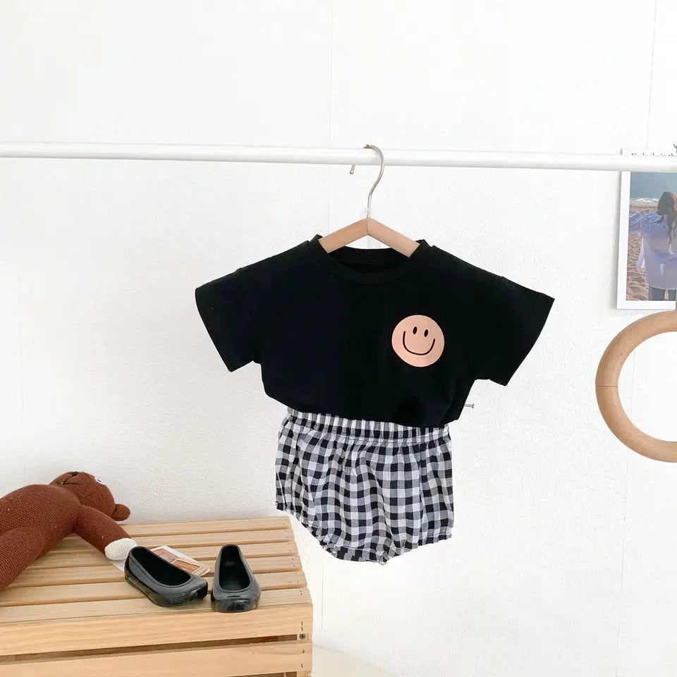 Smiley Face T-shirt and Plaid Shorts