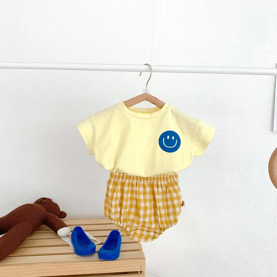 Smiley Face T-shirt and Plaid Shorts