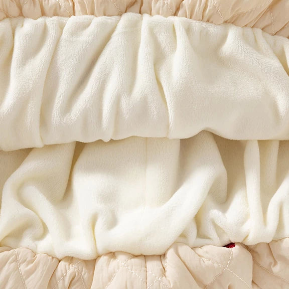 Soft fleece lining inside the bubble hem of the quilted dress