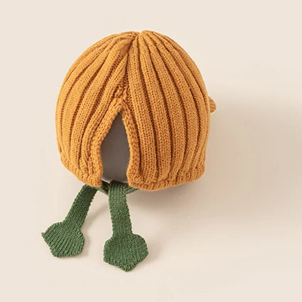 Back view of the pumpkin frog knit hat with green frog-leg ties