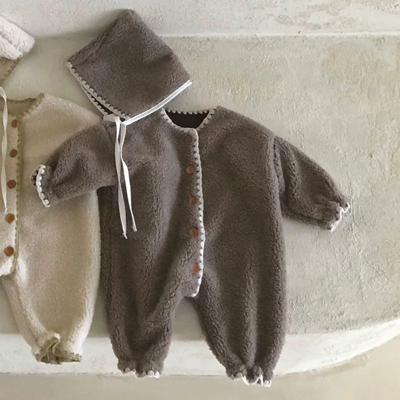 Mocha teddy plush romper with scalloped trim and button front