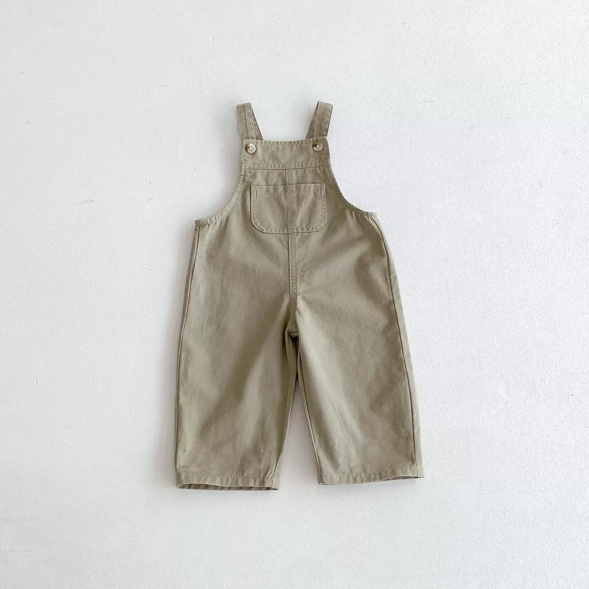 Khaki twill kids overalls, flat lay