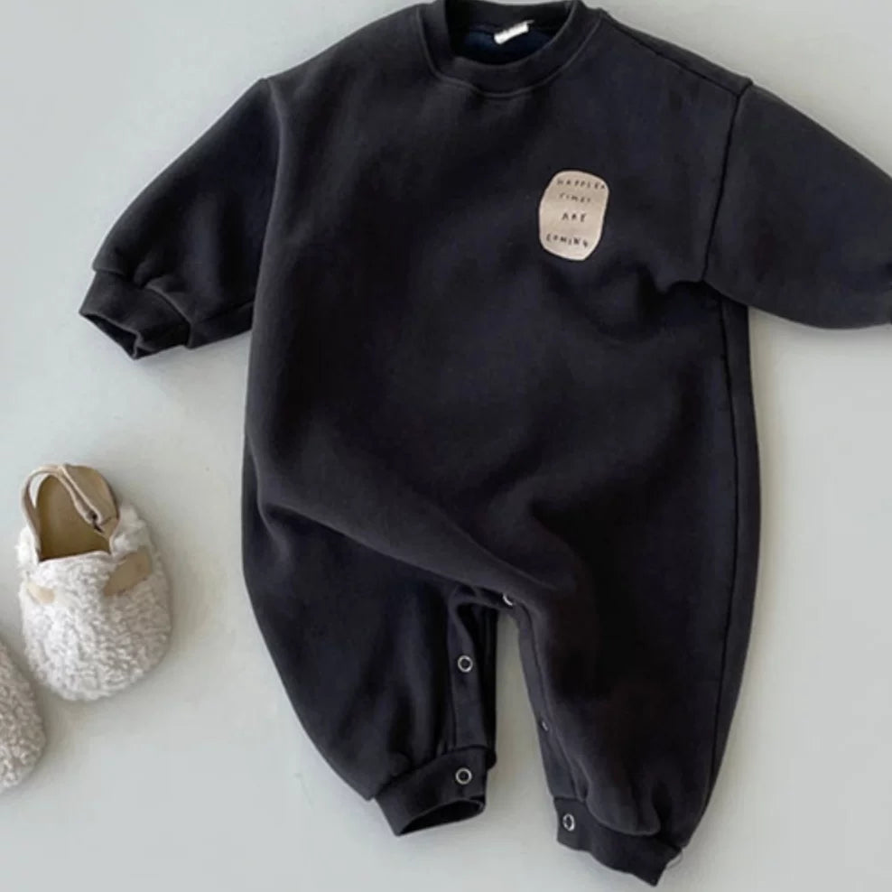 Charcoal fleece-lined baby onesie with ribbed cuffs and snap legs