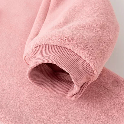 Ribbed ankle cuff and soft fleece on the rose romper leg