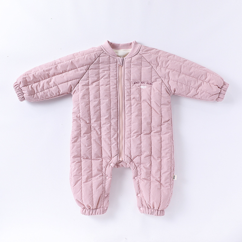 Unicorn pink quilted baby romper with zip front, flat lay