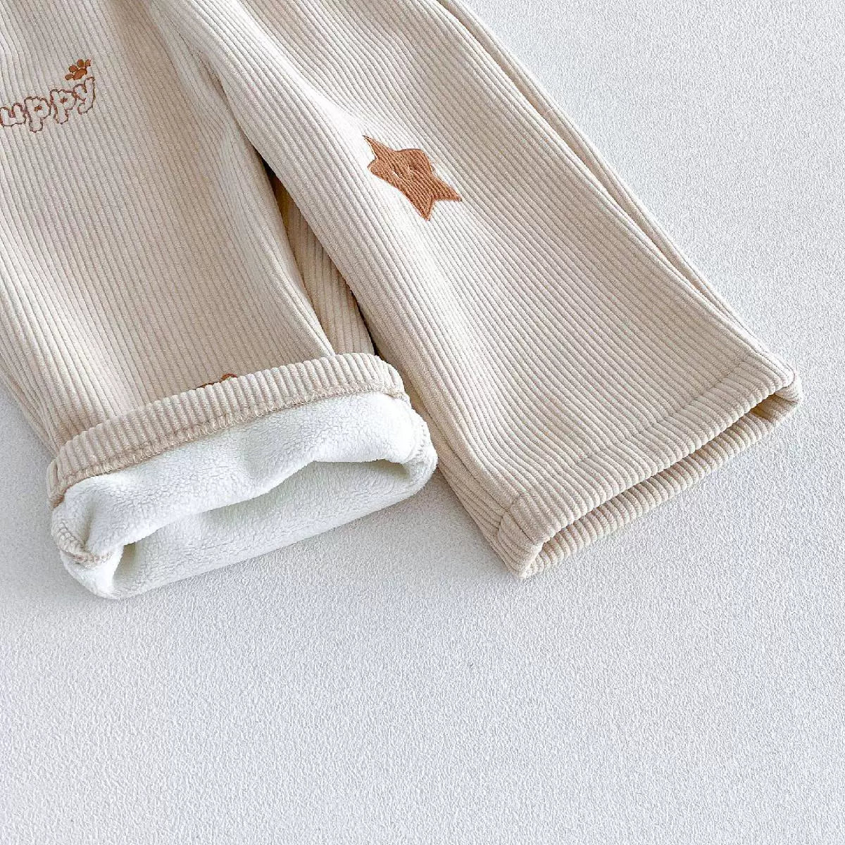 Rolled cuff showing the soft fleece lining