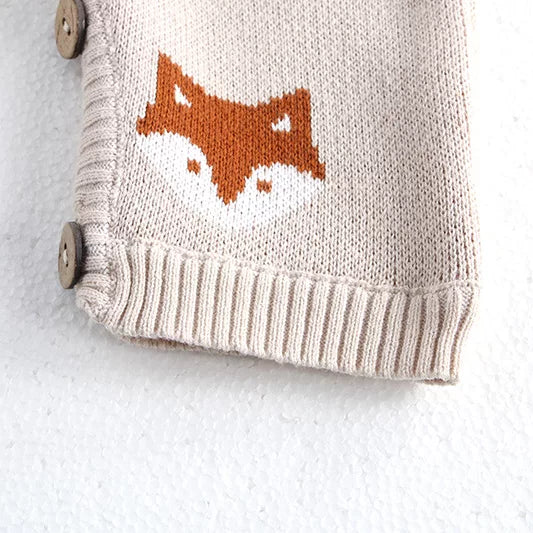 Ribbed knit cuff and wooden button on fox baby overalls