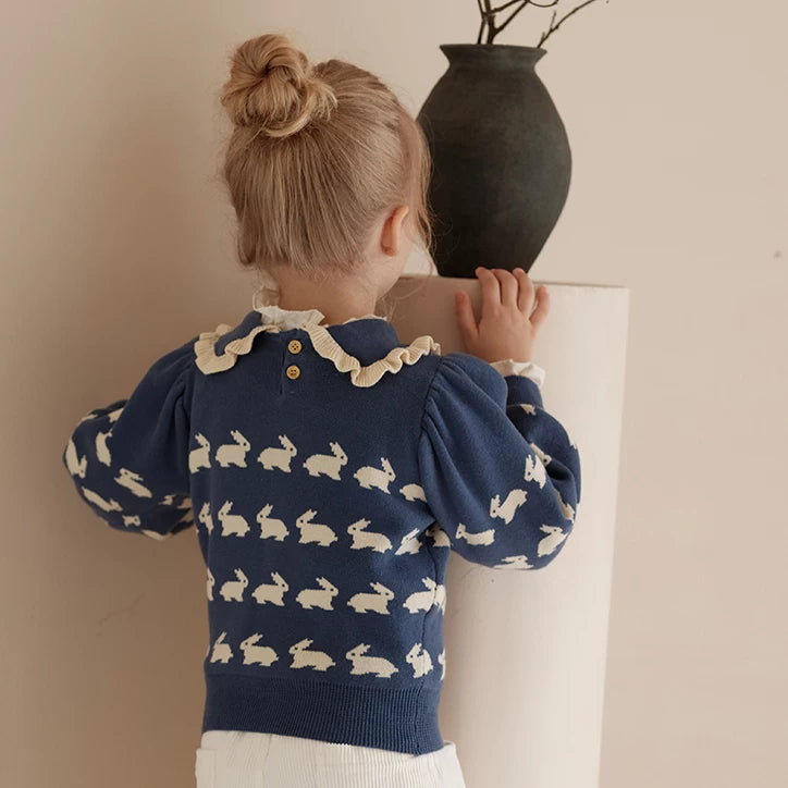 Back view of the bunny sweater with button collar detail