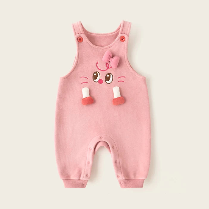 Rose pink fleece overall romper with a sweet embroidered face and bow, flat lay