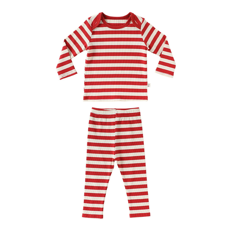 Red and cream striped toddler top and pants set, flat lay