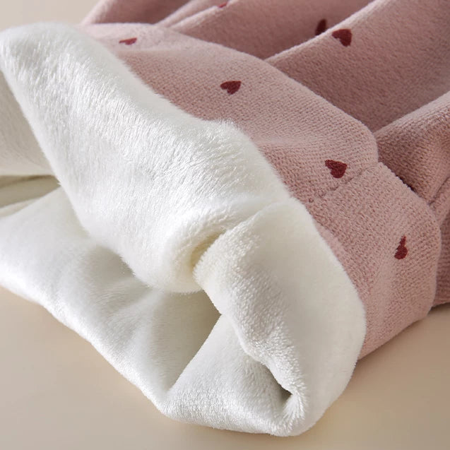 Warm white plush lining inside the heart-print winter overalls
