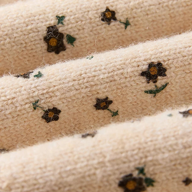 Close-up of the ditsy floral knit pattern