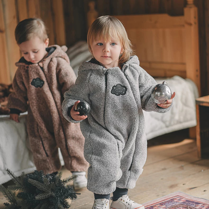 Two toddlers in matching mocha and grey teddy fleece rompers
