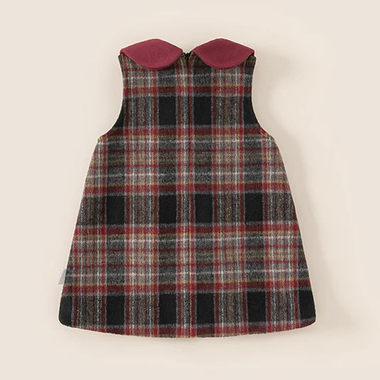 Back of red and grey plaid pinafore dress with collar