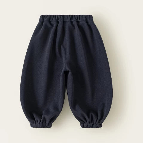 Back view of navy girls jogger pants with elastic waist