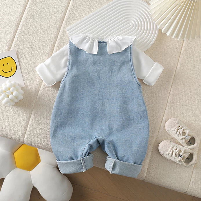 Back view of the light denim overalls with ruffle collar top
