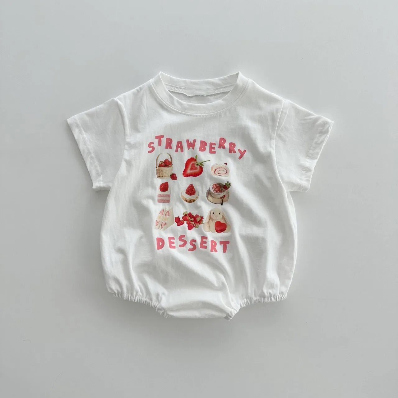 White baby bodysuit with strawberry dessert graphic print, bubble romper