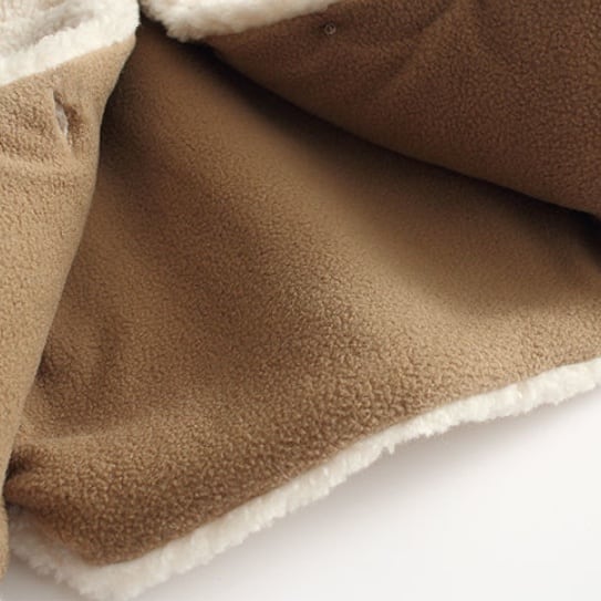 Soft brown fleece lining inside the sherpa vest
