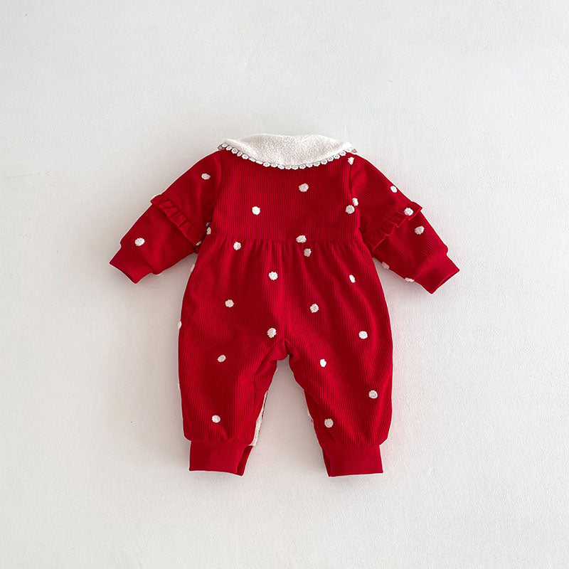 Back view of red polka dot baby jumpsuit