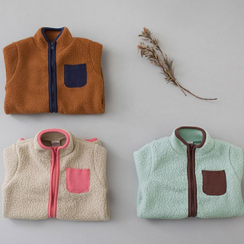 Folded brown, beige and green sherpa baby jumpsuits