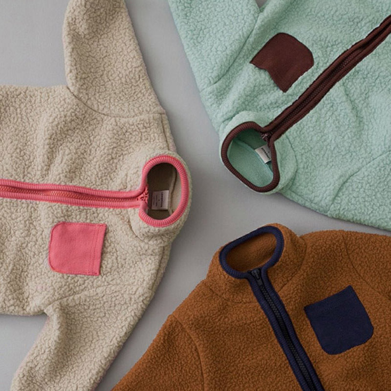 Zip and pocket details on baby sherpa jumpsuits