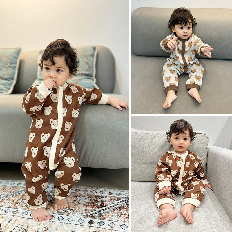 Baby wearing brown and beige bear knit jumpsuits