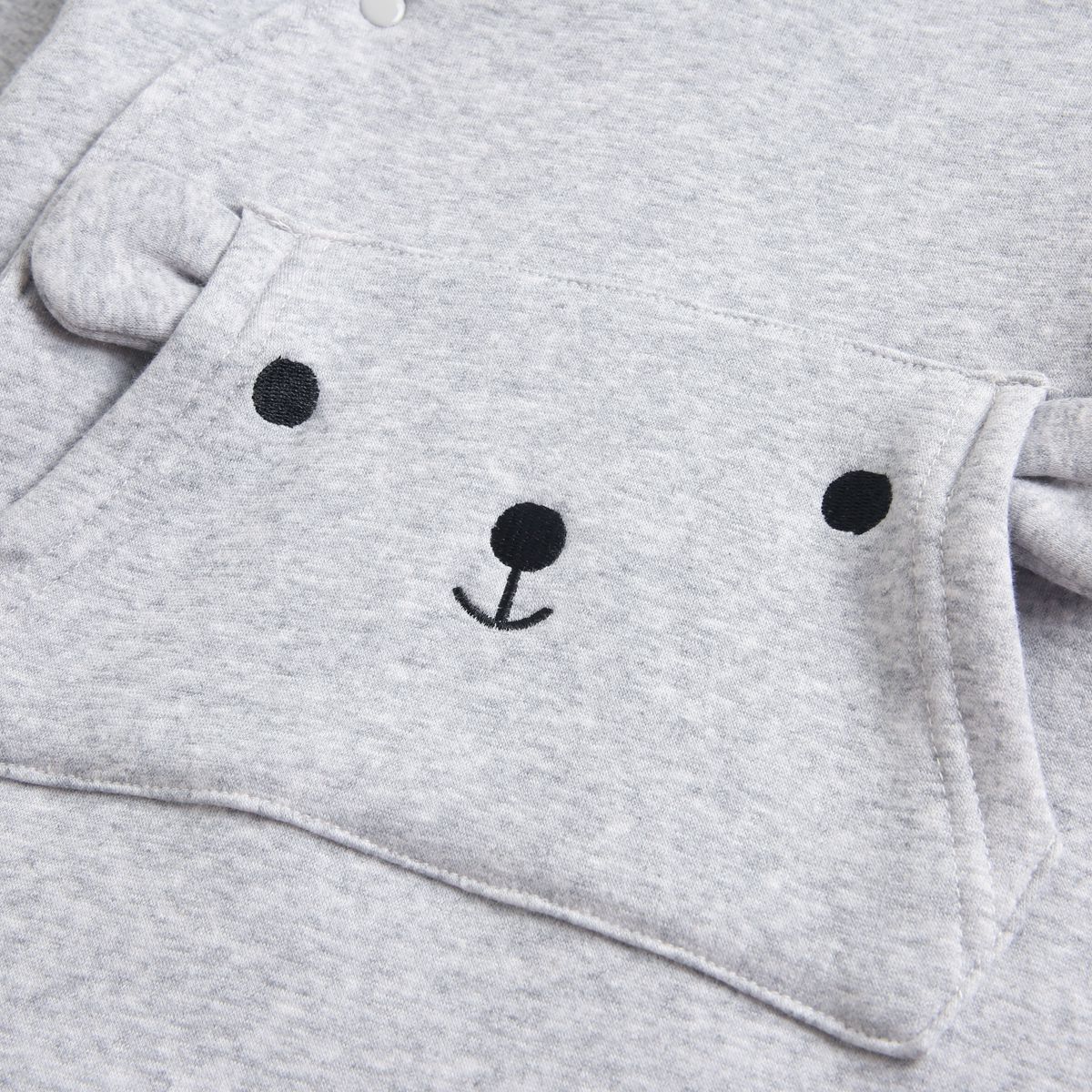 Close-up of bear face pocket with ears