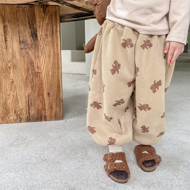 Toddler wearing beige bear print thermal pants