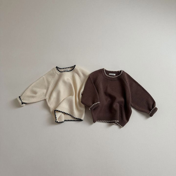 Beige and brown knit sweaters with contrast trim