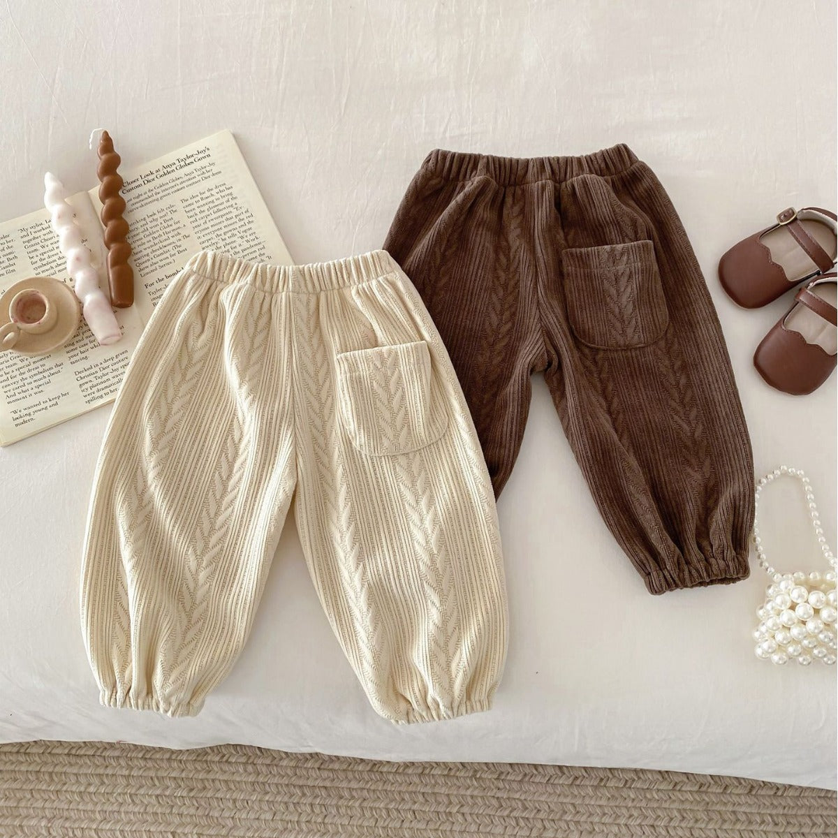 Beige and brown trousers showing pocket