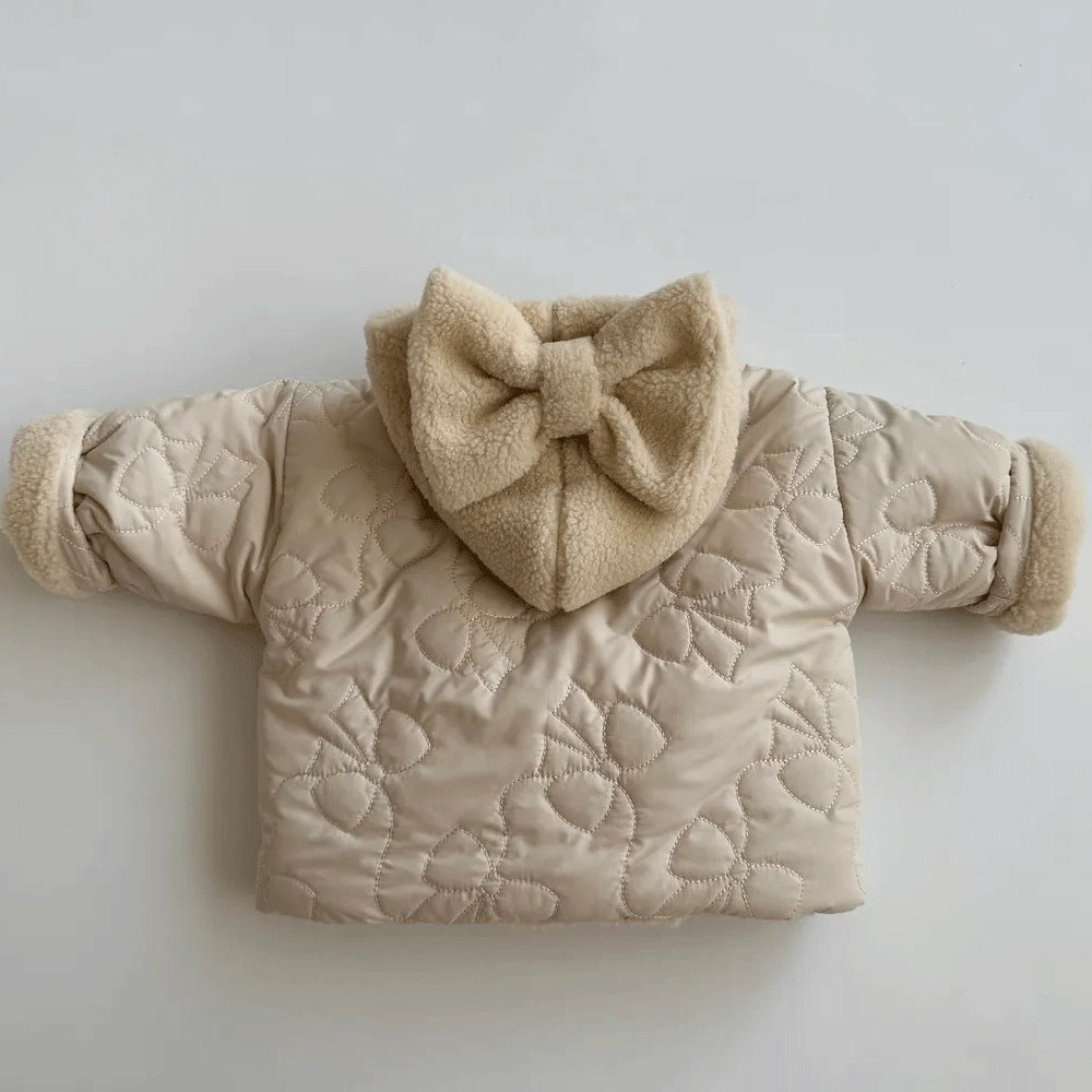 Back view of beige jacket showing bow hood