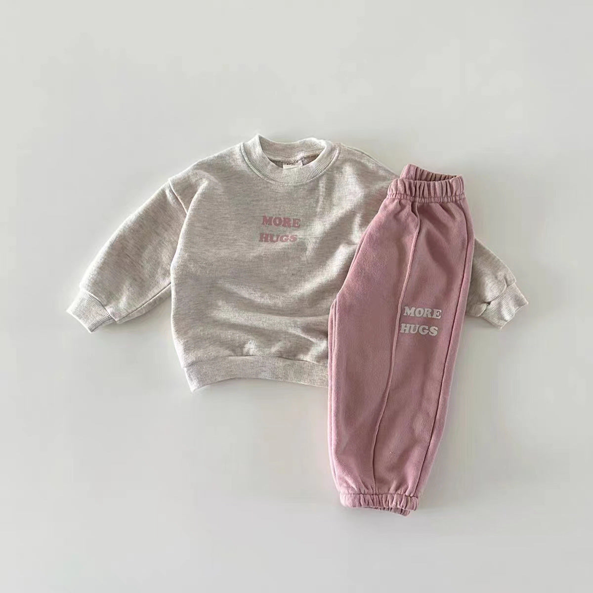 Beige More Hugs sweatshirt with pink joggers