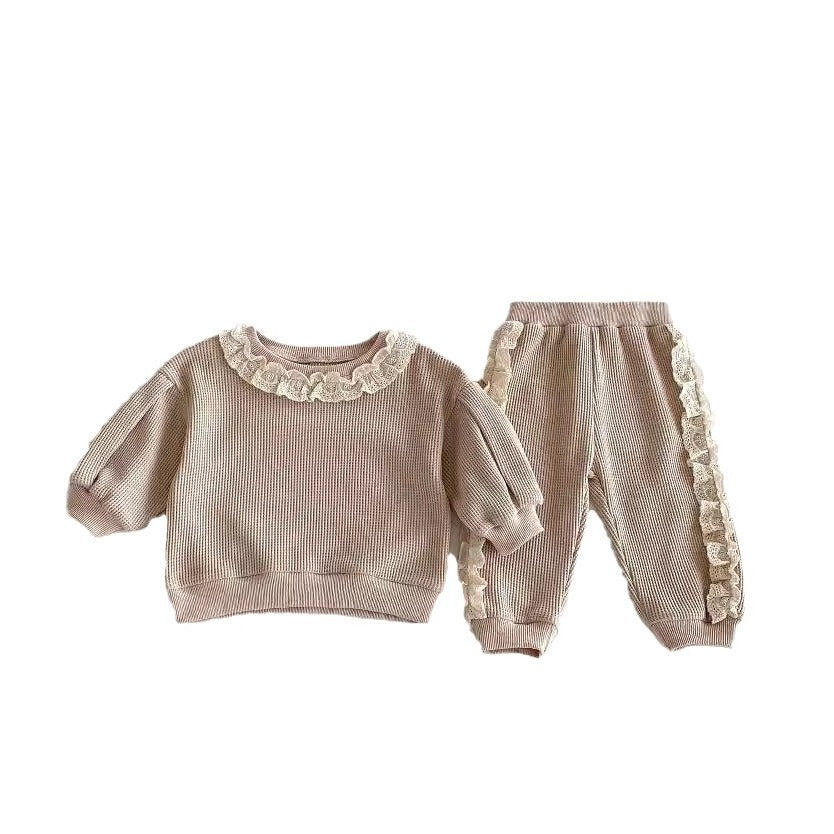 Brown frill trim sweater and joggers on white background
