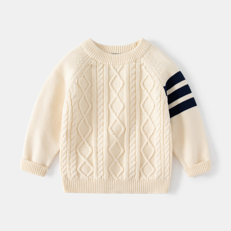 Cream cable knit baby sweater with navy sleeve stripes