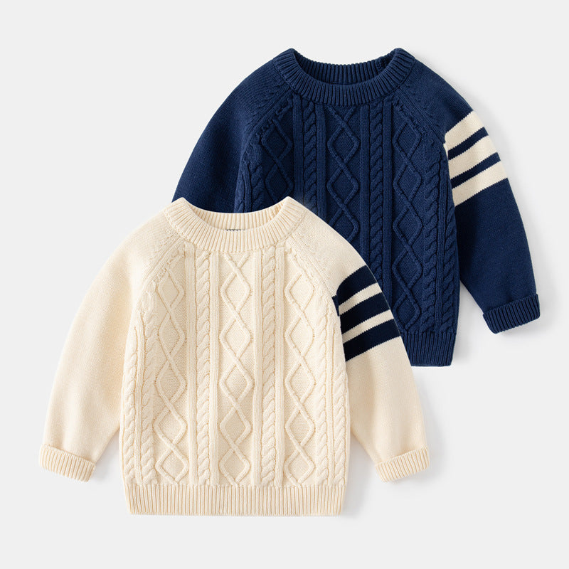 Cream and navy cable knit sweaters with varsity sleeve stripes