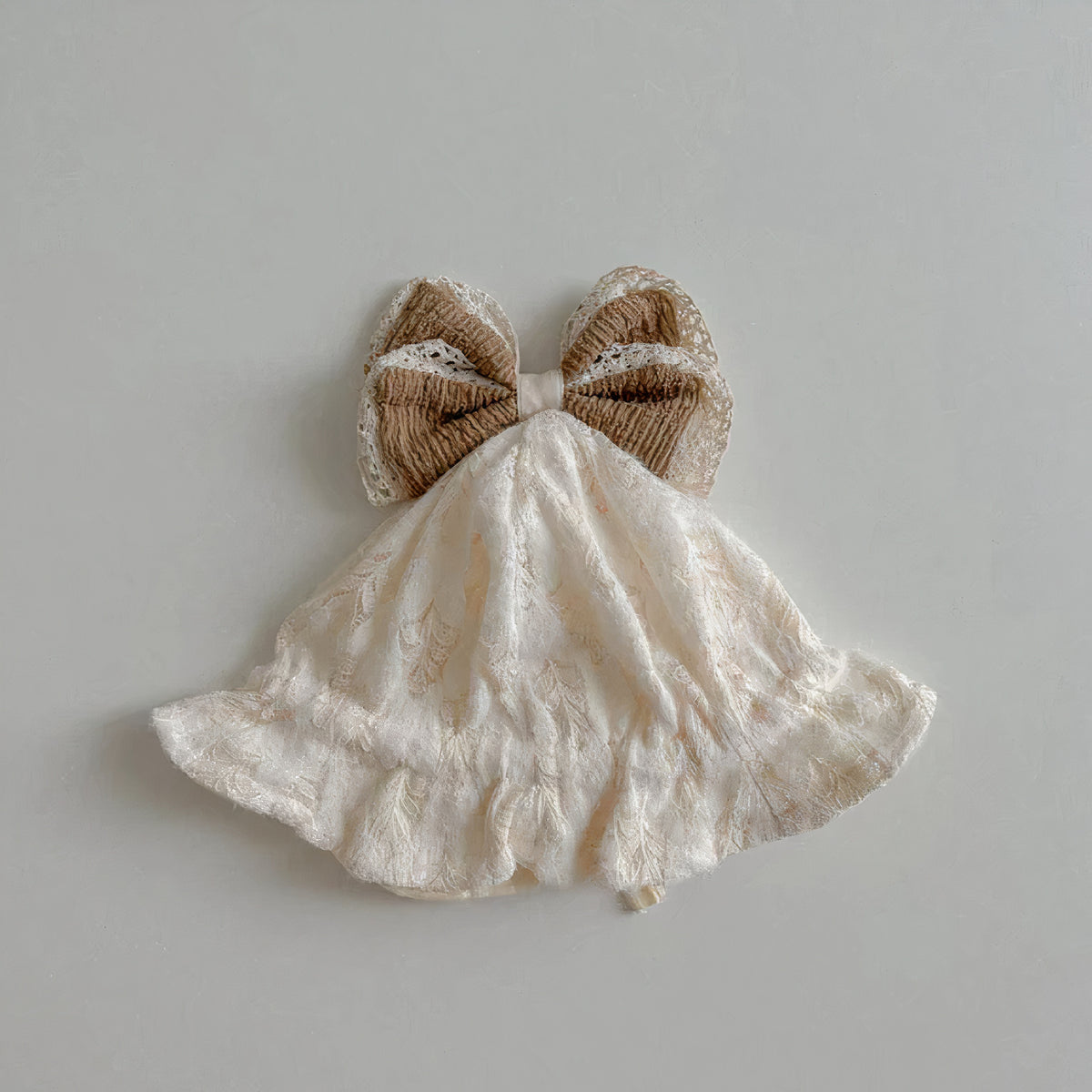 Cream cotton baby sun hat with brown bow