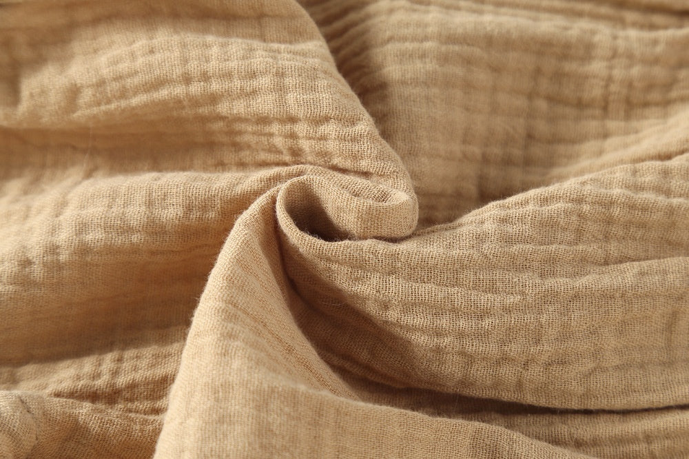 Close-up of soft crinkle cotton muslin texture