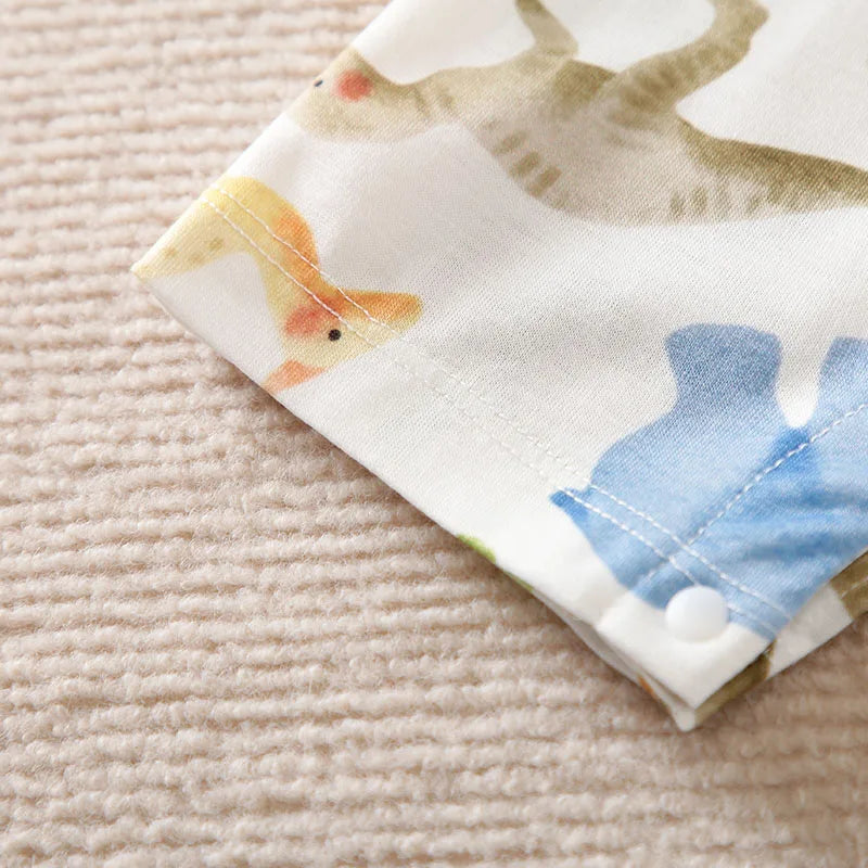 Close-up of leg hem on dinosaur romper