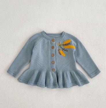 Front of embroidered long sleeve knit baby cardigan jacket in dusty blue with wooden buttons