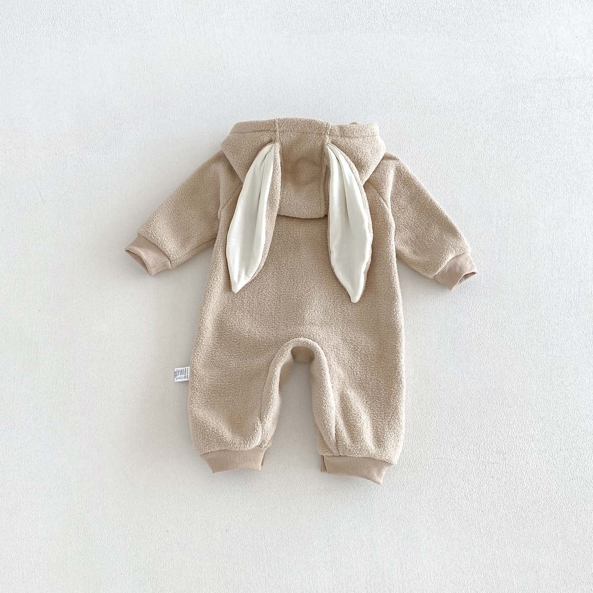 Back of the latte bunny romper with cream ears