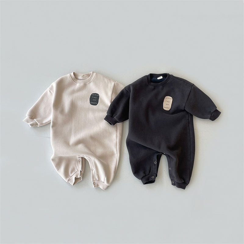 Beige and black fleece-lined sweatshirt baby rompers with patch print