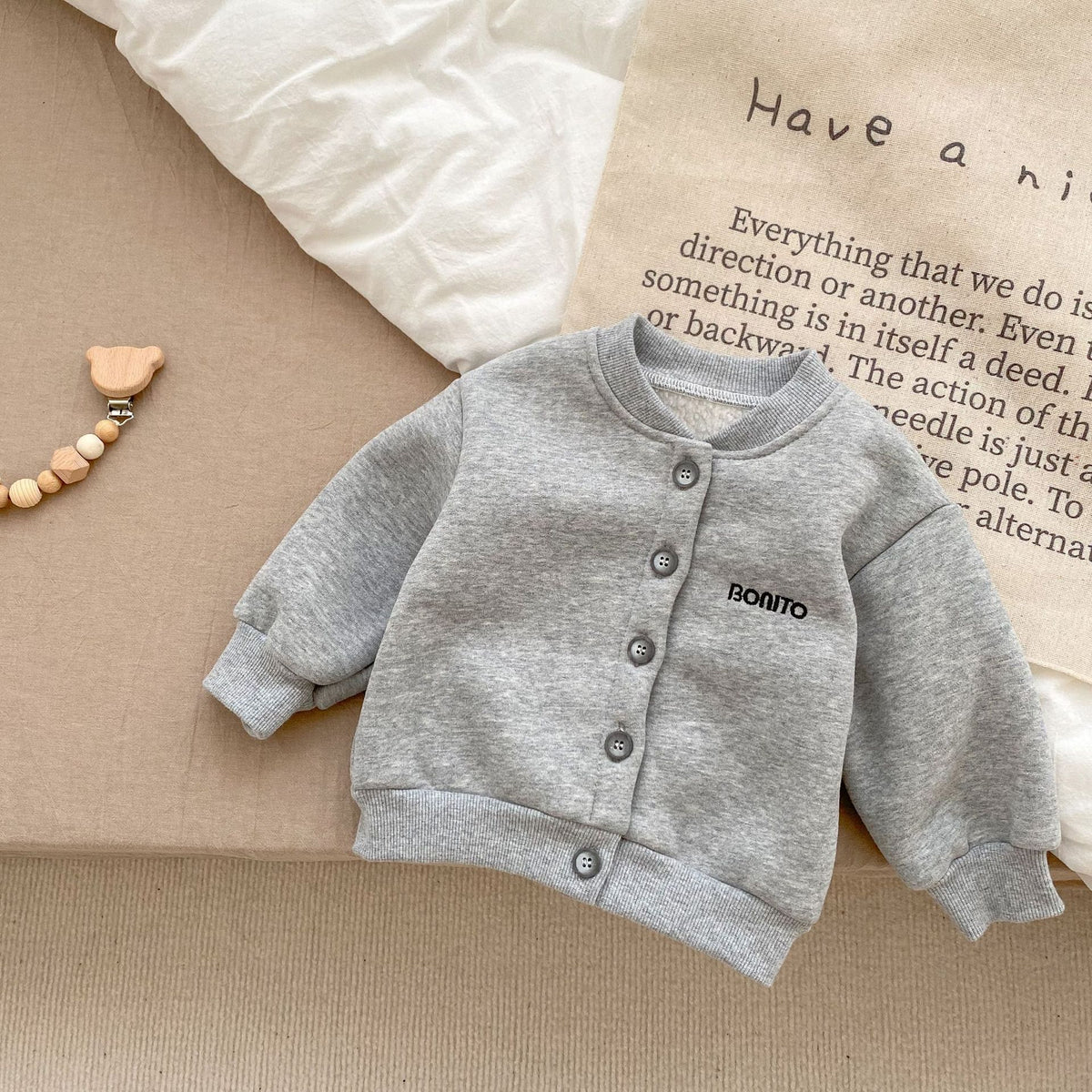 Gray fleece-lined button baby jacket